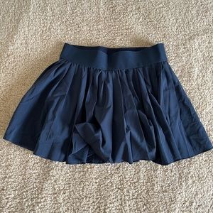 Aritzia TNA navy skirt with shorts